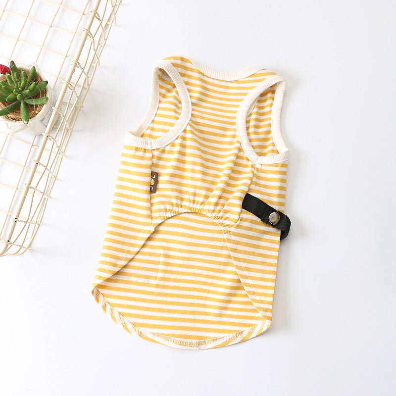 Yellow striped dog shirt with green backpack