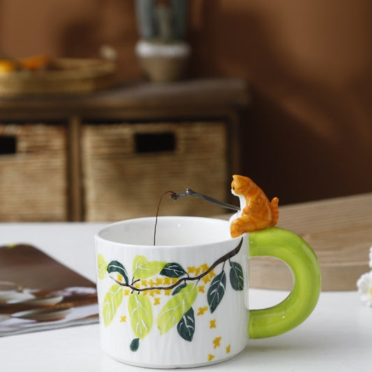 Close-up of animal coffee cup handle (3D cat)